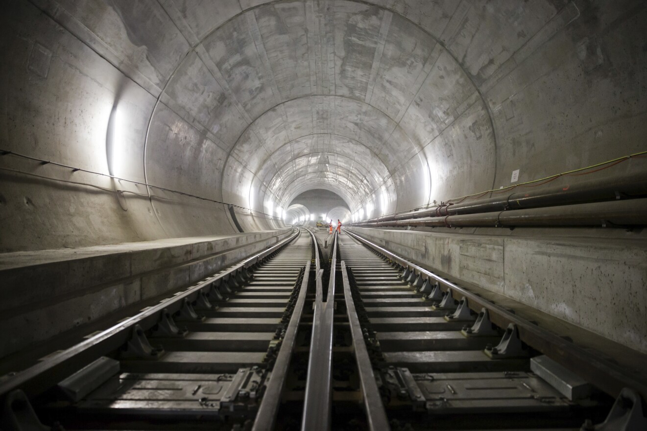Train tracks lead toward an access tunnel inside the east section of the Gotthard Base Tunnel in Faido, Switzerland, in 2014. The tunnel had its opening ceremony on Wednesday.